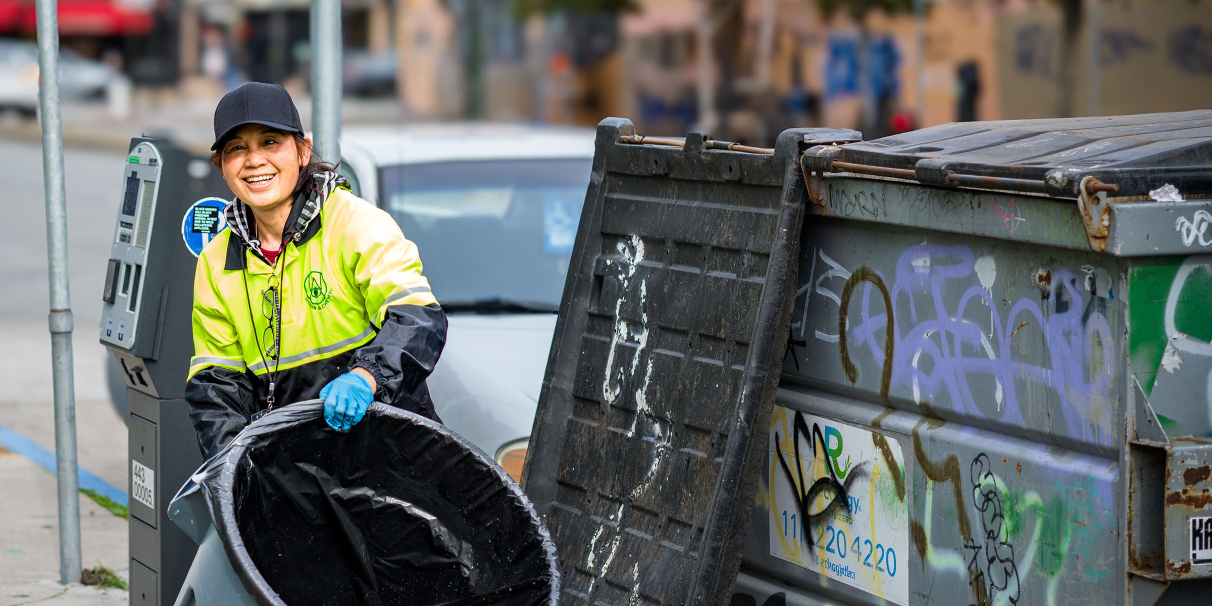 Urban Alchemy practitioner cleaning streets